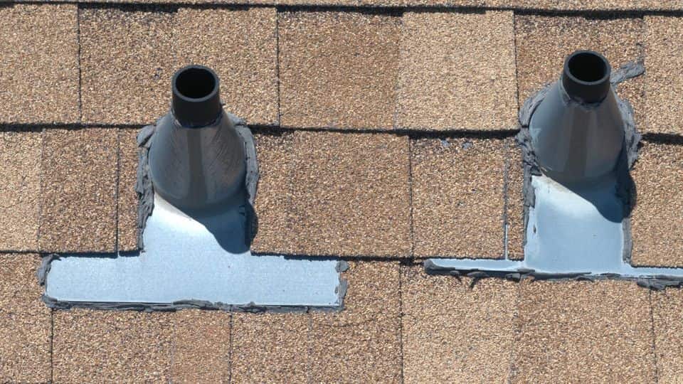 Pipe boots and flashing on asphalt shingles, a common roof repair on Utah homes.