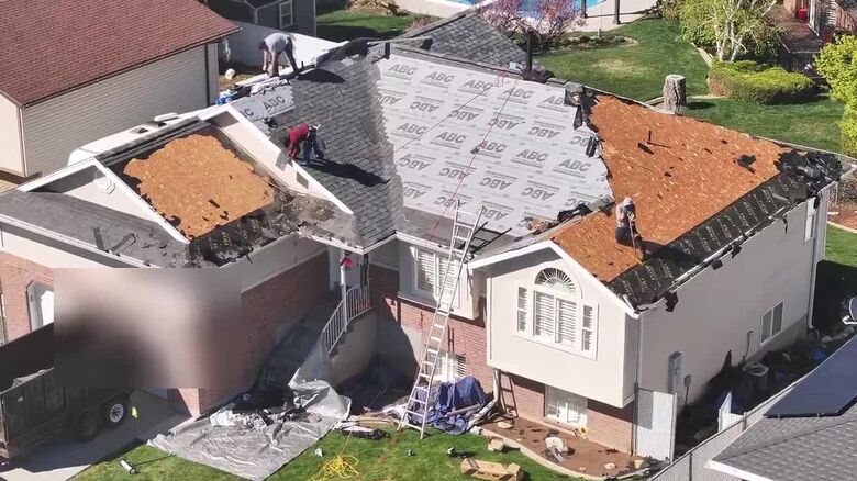 Roof replacement underway on a Utah home: underlayment down and new asphalt shingles going on.